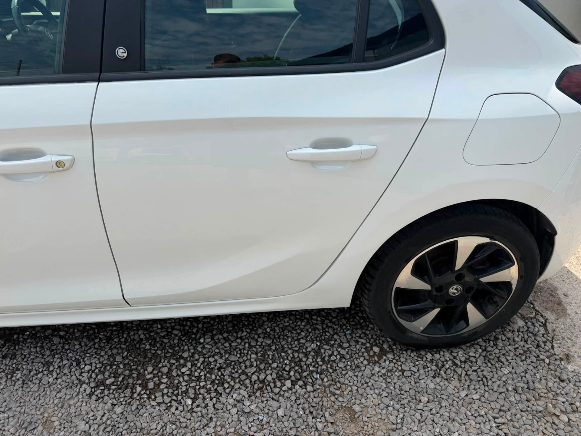 White Vauxhall rear door and panel after repair